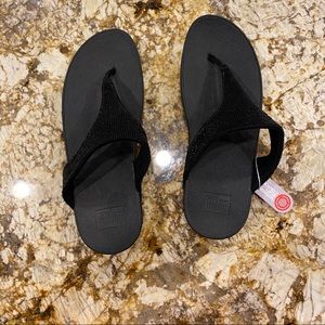 black sparkly sandals/flip flops
